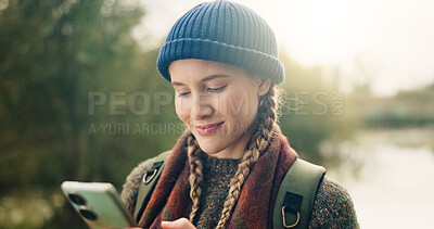Buy stock photo Phone, happy and woman in nature for backpacking with online maps for directions on hike trail. Smile, technology and female person with cellphone for trekking tips on blog on mobile app in forest.