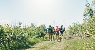 Buy stock photo Hiking, walking and back with friends in nature for travel destination, adventure and peace. Space, vacation and eco tourism explore with people outdoor for trekking, wilderness and holiday break