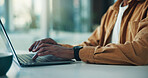 Laptop, typing and hands of businessman in office with research for creative project online. Technology, planning and male magazine editor with email for article with publishing feedback in workplace