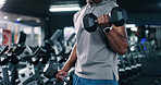 Arm, dumbbell and exercise with man in gym for bodybuilding, strength training or workout routine. Fitness, space and weightlifting with bodybuilder person in health club for physical challenge