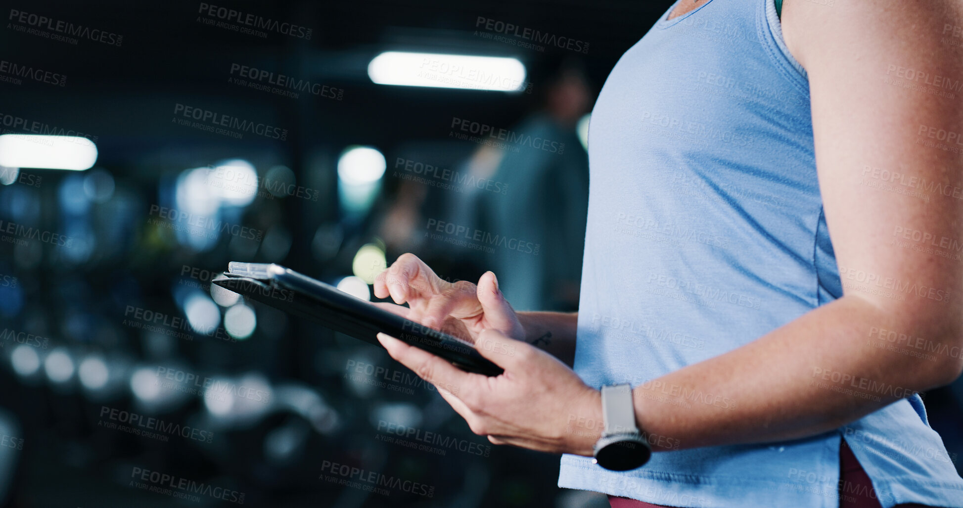 Buy stock photo Person, hands and scroll in gym with tablet, workout research and sign up for personal trainer program. Bokeh, woman and digital tech with exercise website, internet and registration for fitness app.