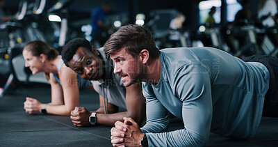 Buy stock photo Plank, balance and group in gym, exercise and routine to improve posture, instructor or health goals. Bodybuilder, wellness and people with trainer for metabolism boost and workout for strength