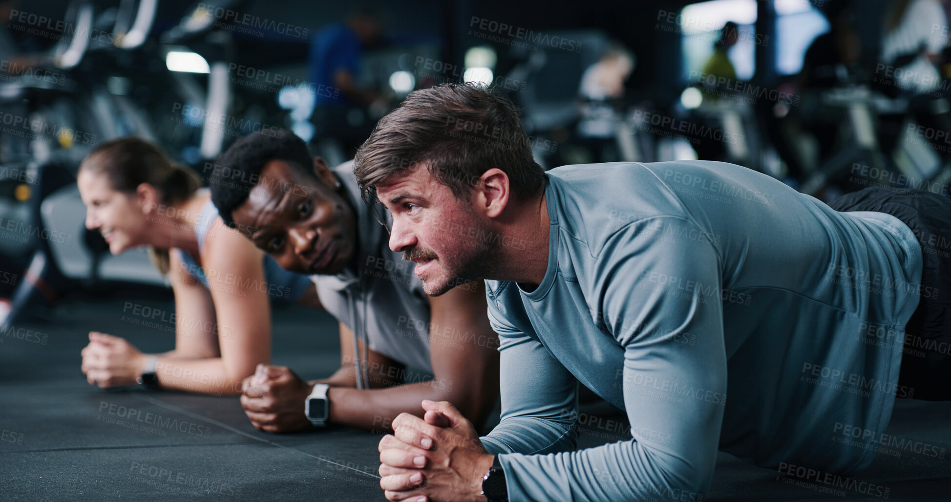 Buy stock photo Plank, balance and group in gym, exercise and routine to improve posture, instructor or health goals. Bodybuilder, wellness and people with trainer for metabolism boost and workout for strength