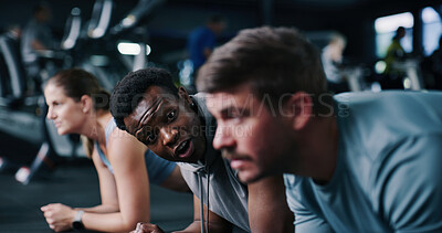 Buy stock photo Group, plank and talking in gym, exercise or routine to improve posture, instructor and bodybuilding. Wellness, personal trainer and people with balance for metabolism boost and training for strength