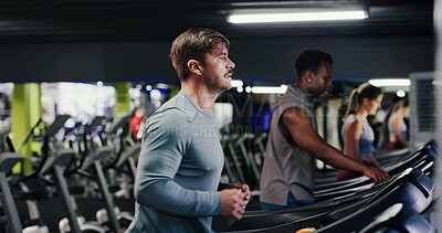 Buy stock photo Running, training and man on treadmill in gym, workout and endurance for fitness with challenge. Cardio machine, health and person in exercise club for sports, energy and practice for wellness