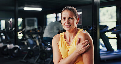 Buy stock photo Portrait, woman and discomfort with shoulder pain at gym of fitness injury, muscle fatigue and burnout. Female person, strain and ache from poor warm up, inflammation and tendinitis with joint cramps