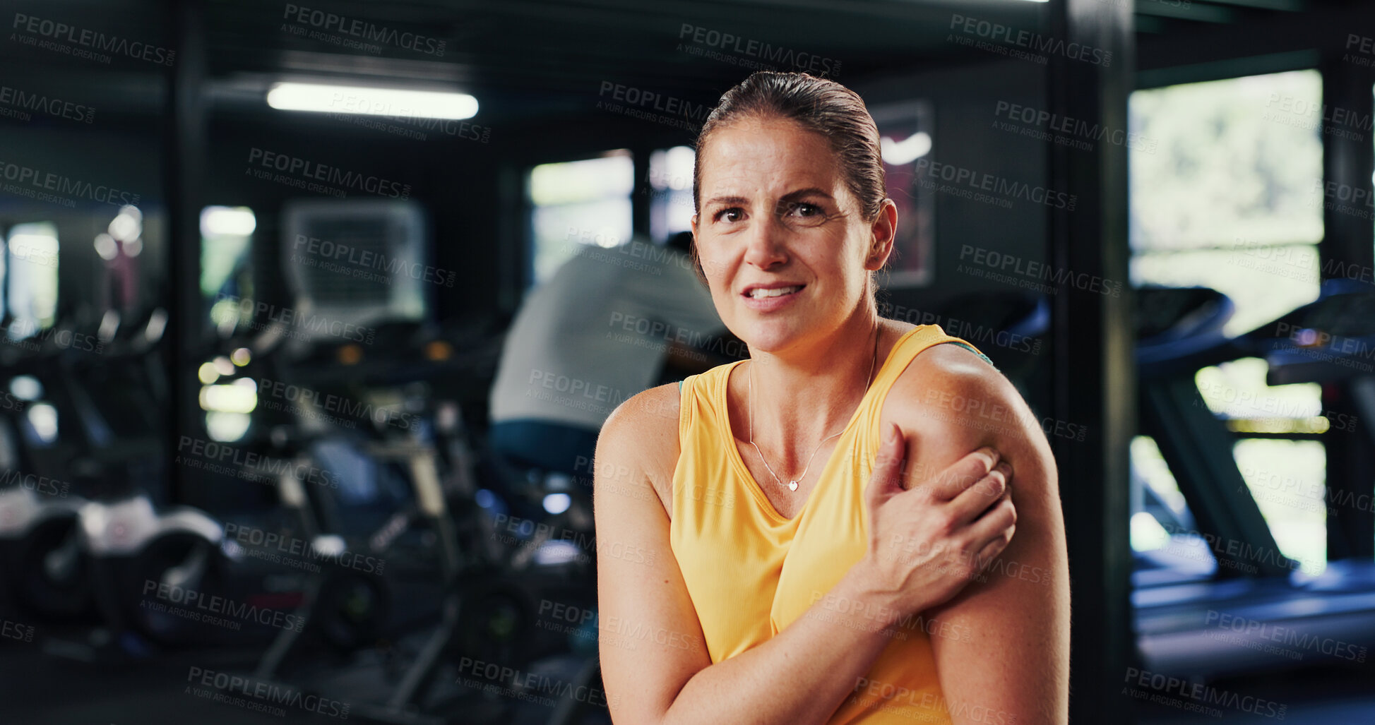 Buy stock photo Portrait, woman and discomfort with shoulder pain at gym of fitness injury, muscle fatigue and burnout. Female person, strain and ache from poor warm up, inflammation and tendinitis with joint cramps