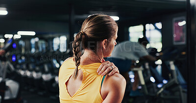 Buy stock photo Back, athlete and woman with shoulder pain at gym of fitness injury, muscle fatigue and burnout. Female person, strain and sore from poor warm up, physical discomfort and tendinitis with joint cramps
