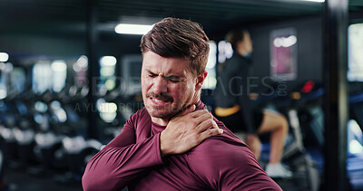 Buy stock photo Athlete, man and sore with shoulder pain at gym of fitness injury, muscle fatigue and burnout. Male person, strain and pressure from fibromyalgia, physical discomfort and tendinitis with joint cramps