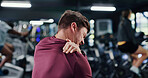 Back, man and discomfort with shoulder pain at gym of fitness injury, muscle fatigue and burnout. Male person, inflammation and strain of fibromyalgia, herniated disc and tendinitis with joint cramps