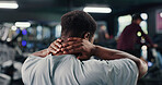 Back, athlete and man with neck pain at gym of fitness injury, muscle fatigue and burnout. Male person, strain and inflammation from fibromyalgia, physical discomfort and joint cramps of tendinitis