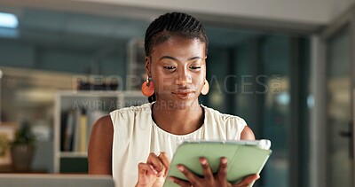 Buy stock photo Creative, online and woman with tablet, office and research for ad campaign, scroll or working late. Social media manager, browsing and black person with tech for marketing and deadline at night