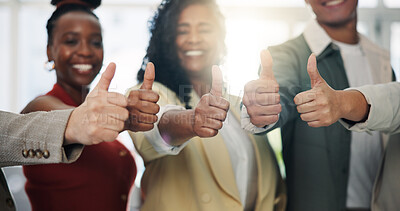 Buy stock photo Thumbs up, collaboration and hands of business people in office for teamwork with approval for project. Happy, group and creative editors with gesture for agreement, solidarity or vote in workplace.