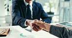 Shaking hands, deal and documents at at office meeting, graphs and goals with agreement at company. Business people, success and handshake with motivation, feedback or collaboration at finance agency