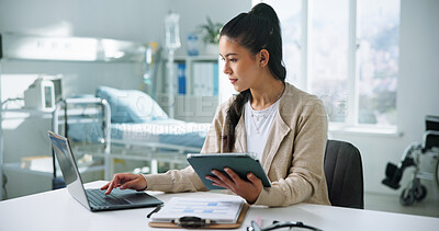 Buy stock photo Receptionist, laptop and tablet with woman in hospital for medical files, doctor letter and researcher. Healthcare, surgery schedule and telehealth appointment with person in clinic for online admin