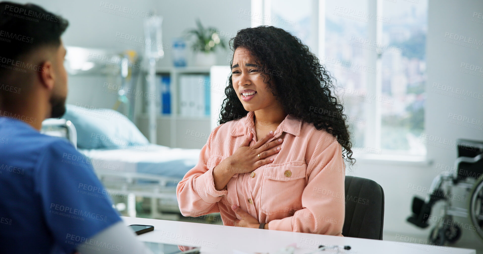 Buy stock photo Consultation, chest pain and woman with doctor in office at hospital for diagnosis, advice or help. Checkup, discussion and female patient with healthcare worker for treatment with sickness in clinic