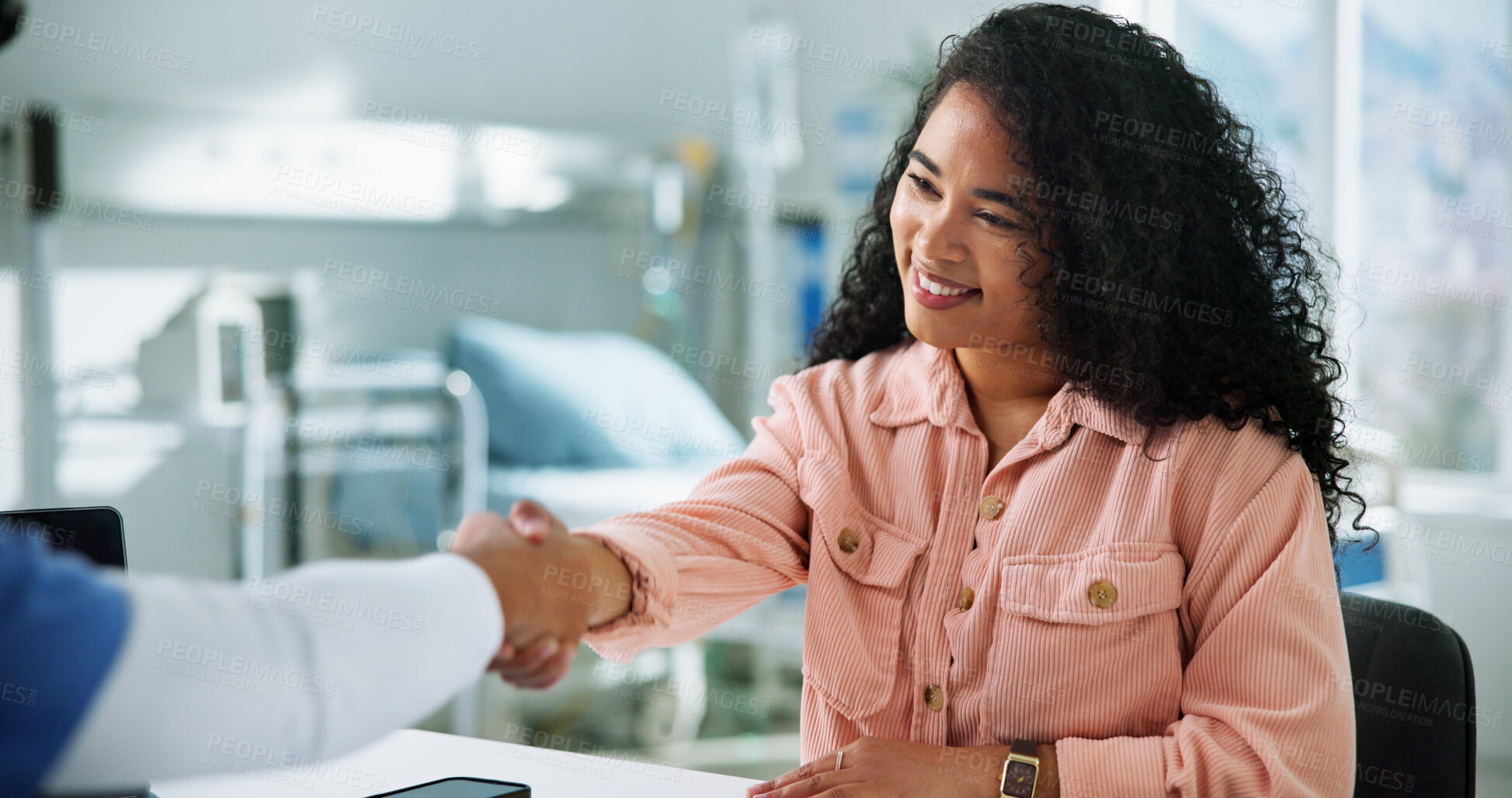 Buy stock photo Woman, doctors and shaking hands at clinic, patient and thanks for healthcare services in office. People, medical expert and smile for handshake in consultation, good news and gratitude at hospital