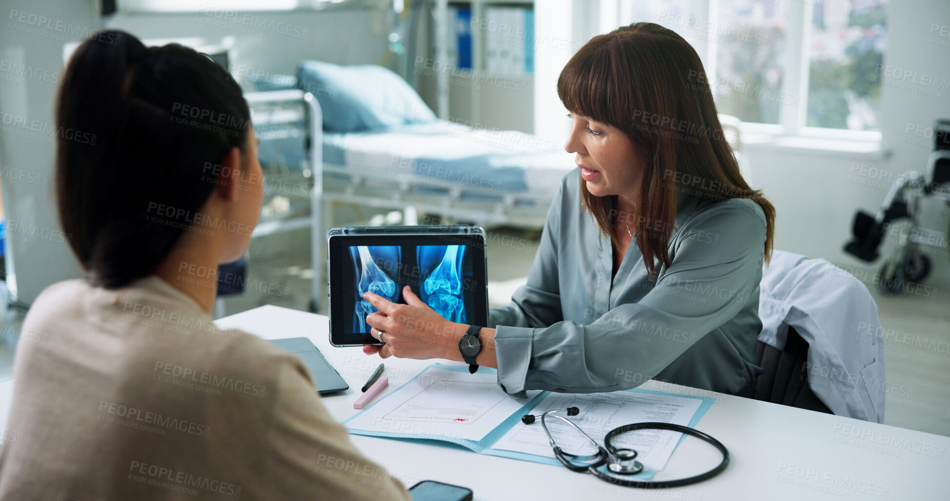 Buy stock photo Doctor, woman and tablet for xray with consultation, bone fracture and results or diagnosis. Healthcare, patient and professional with MRI screen in clinic for knee dislocation and treatment plan