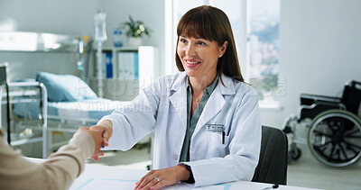 Buy stock photo Woman, doctor and handshake with patient, hospital and thanks for healthcare services in office. People, medical expert and smile for shaking hands in consultation, good news and gratitude at clinic