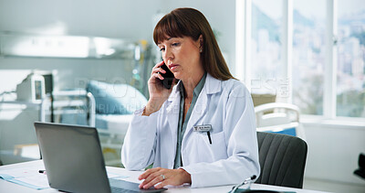 Buy stock photo Clinic, doctor and woman with laptop, phone call or discussion with contact for appointment schedule. Hospital, telehealth and mature person with tech for communication, online and medical diagnosis