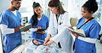 Doctor, nurses and infant CPR on mannequin for medical simulation, demonstration or rescue notes. People, health interns and pediatrician with doll in clinic for baby chest compressions and technique