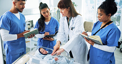 Buy stock photo Doctor, nurses and infant CPR on mannequin for medical simulation, demonstration or rescue notes. People, health interns and pediatrician with doll in clinic for baby chest compressions and technique