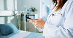 Phone, typing and hands of doctor in hospital for online schedule, notification and communication. Healthcare, clinic and woman on smartphone for email, medical research and contact for telehealth