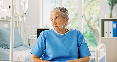Buy stock photo Thinking, sad and senior woman in hospital for healing, recovery and unhappy for surgery. Healthcare, thoughtful and elderly patient with worry for operation, diagnosis and treatment for wellness