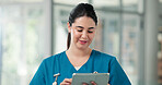 Tablet, woman and nurse in hospital with reading medical research, telehealth or online support. Happy, digital technology and female healthcare worker with surgery schedule in clinic hallway.