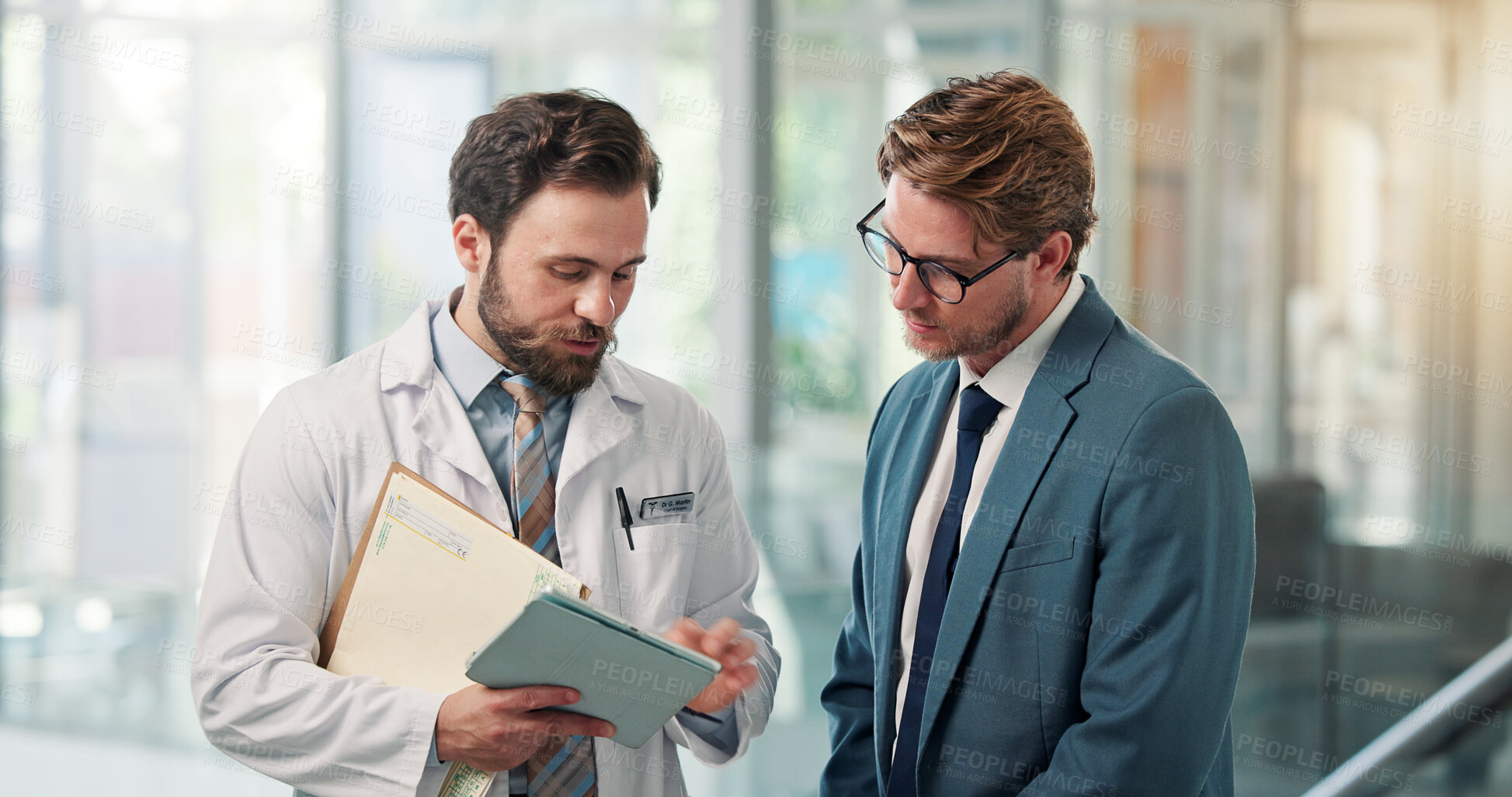 Buy stock photo Doctor, businessman or tablet with discussion in clinic for appeal process, clarify billing info or claim. Health insurance specialist, men and tech in hospital for case management or policy coverage