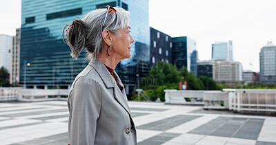 Buy stock photo Businesswoman, walk and thinking in city with idea, contemplation and planning for urban development. Mature person, outdoor and reflection downtown for real estate, property investment and insight.