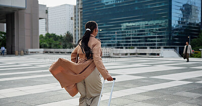 Buy stock photo Walking, city or business woman with luggage for stakeholder meeting, travel trip or international client. Urban, back or professional person with suitcase for growth opportunity, overseas or commute