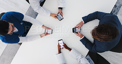 Buy stock photo Boardroom, group and doctors with phone screen, online and research for treatment plan and teamwork. Hospital, healthcare workers and collaboration with diagnosis on web, above and people with mobile