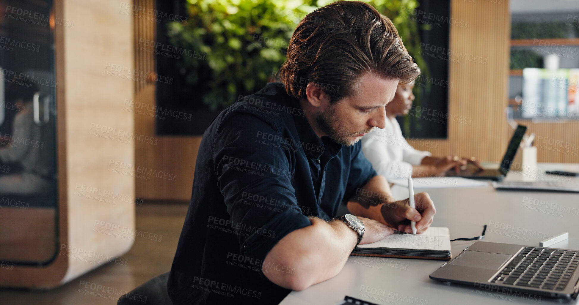 Buy stock photo Design, laptop and writing with business man in coworking office for development or planning. Computer, notebook and research with designer person at desk in workplace for agenda or schedule