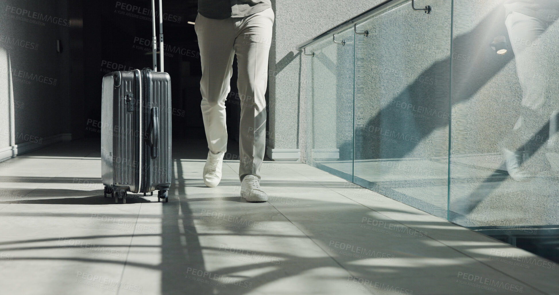 Buy stock photo Business person, legs and walking with suitcase for travel, work commute or job opportunity. Traveler, employee or moving with luggage for company trip, schedule flight or career journey in building