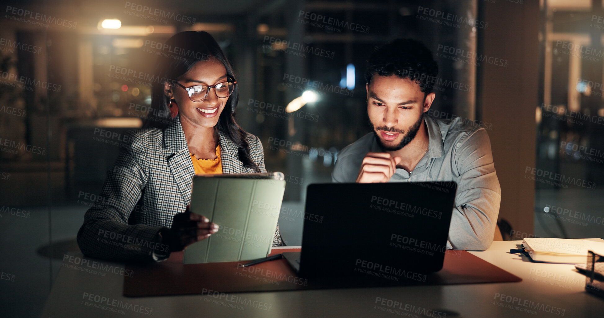 Buy stock photo Tech, research and business people in office at night with creative project in collaboration. Feedback, laptop and manager with magazine editors for advice, publishing deadline or article on tablet