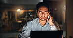 Headache, businessman and night in office on laptop for finance review, deadline and research. Pain, working late and person on computer with fatigue, exhausted and brain fog for financial report