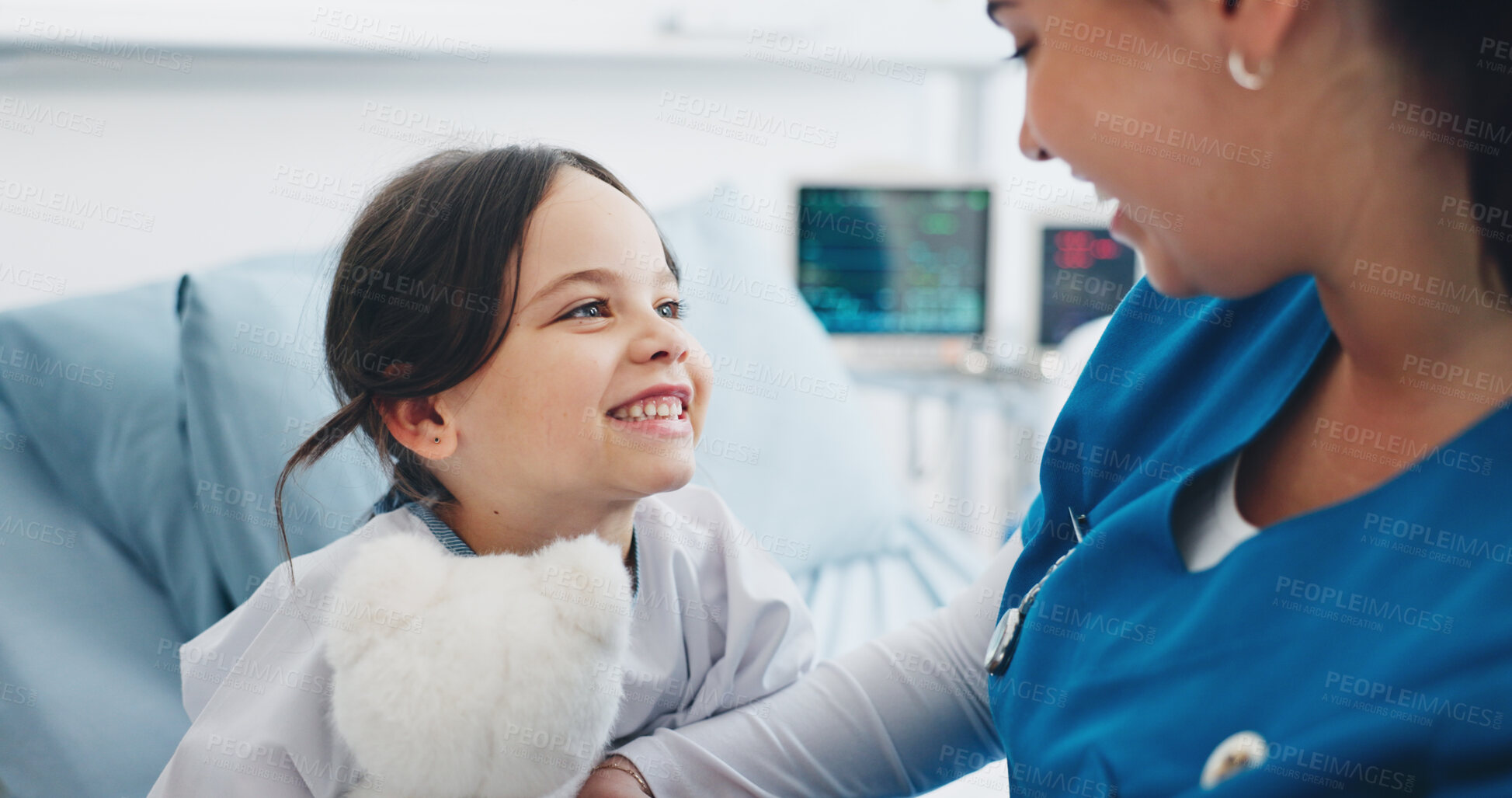 Buy stock photo Happy child, nurse and patient with teddy bear for health checkup, exam or consultation in clinic. Female person, doctor and support care with smile, girl or kid for medical treatment or appointment