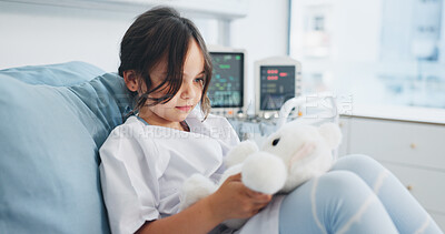 Buy stock photo Teddy bear, medical and child in hospital bed with comfort, support or recovery for surgery. Healthcare, relax and girl kid patient with plush toy for care, healing or wellness in pediatric clinic.