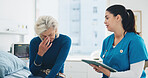 Nurse, tablet and sad senior woman with results in clinic for cancer diagnosis, bad news and support. Retirement health, professional and elderly patient crying on hospital bed for terminal illness