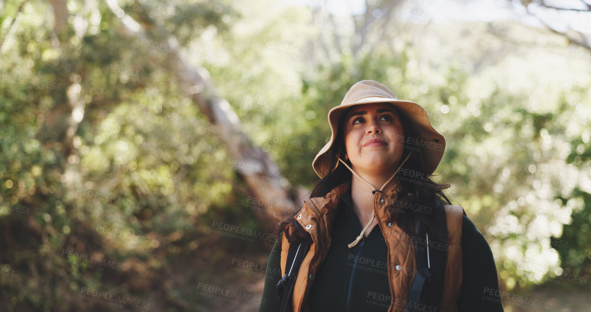 Buy stock photo Thinking, woman and hiking for fitness outdoor with smile, adventure and sightseeing on holiday. Bokeh, person and backpacking with reflection, trekking view and explore nature for vacation in forest