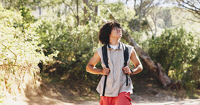 Buy stock photo Man, happy and thinking with hiking in forest for adventure, outdoor and getaway on holiday. Person, smile and nature tourism with perspective for reflection, break or view with trekking in woods