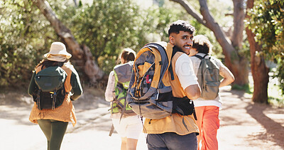 Buy stock photo Back, hiking and travel with portrait of man outdoor in forest for hobby or journey. Backpacking, trekking and walking with group of hiker people on trail in nature together for adventure or bonding