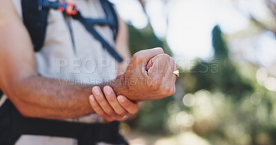 Buy stock photo Hands, wrist pain and hiking with injury in forest for adventure with fatigue, tired or carpal tunnel. Person, outdoor and sore joint with stress, inflammation and rest with burnout with trekking