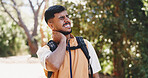 Hiking, neck pain and man with injury in forest, accident or inflammation with muscle tension. Trekking, travel and hurt person in woods with health risk, fibromyalgia and joint strain with bokeh