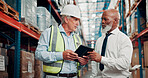 Warehouse, discussion and men with tablet, logistics or team with stock distribution schedule on web. Colleagues, talk and mature people with tech for delivery update, shipping and meeting in factory