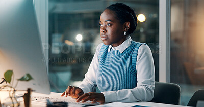 Buy stock photo Office, woman and typing on computer at night for story draft, editing article or publication deadline. Journalist, black person and tech at publishing agency for breaking news coverage and research