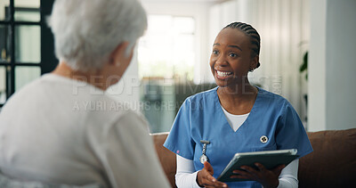 Buy stock photo Discussion, patient and caregiver with tablet on sofa, health evaluation results and medical counseling. Smile, tech and senior person with nurse for wellness report, feedback and good news in home