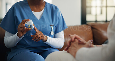 Buy stock photo Nurse, woman and hands with pills in home for healthcare prescription, treatment dose or wellness. Caregiver, person and medicine in house, medical instruction and explain medication schedule