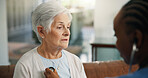 Nursing home, senior woman and nurse with stethoscope, wellness and checkup for heart rate in lounge. Healthcare, consultation and caregiver with equipment for medical exam or elderly person in house